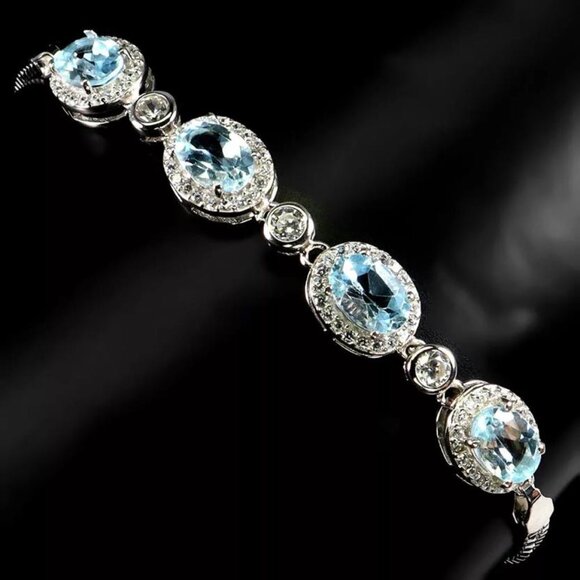 Jewelry - NWT 14K WHITE GOLD Oval Sky Blue Topaz Bracelet 8 Ins